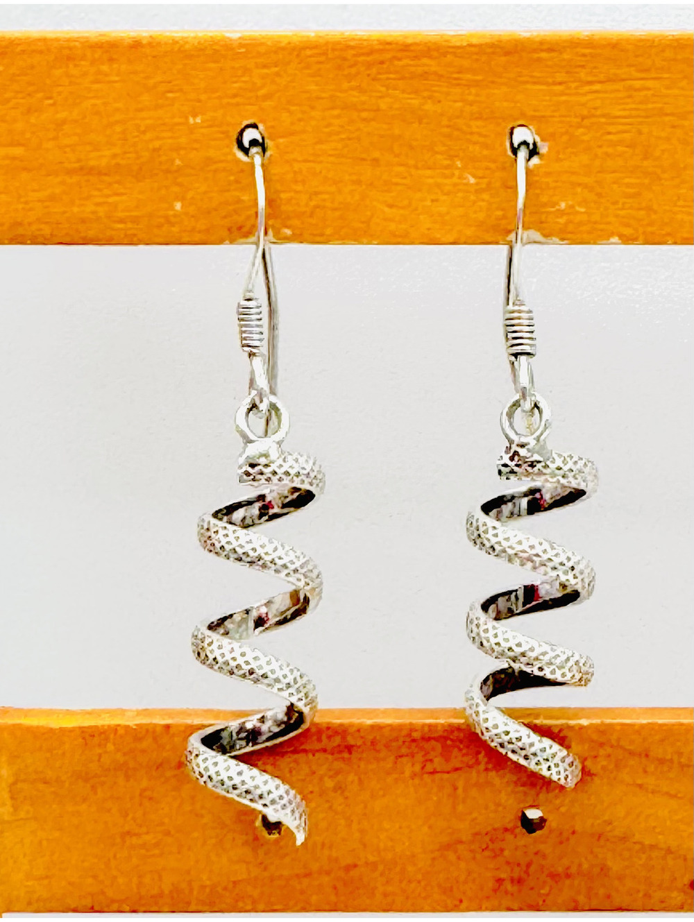 Sterling silver spiral hook drop earrings